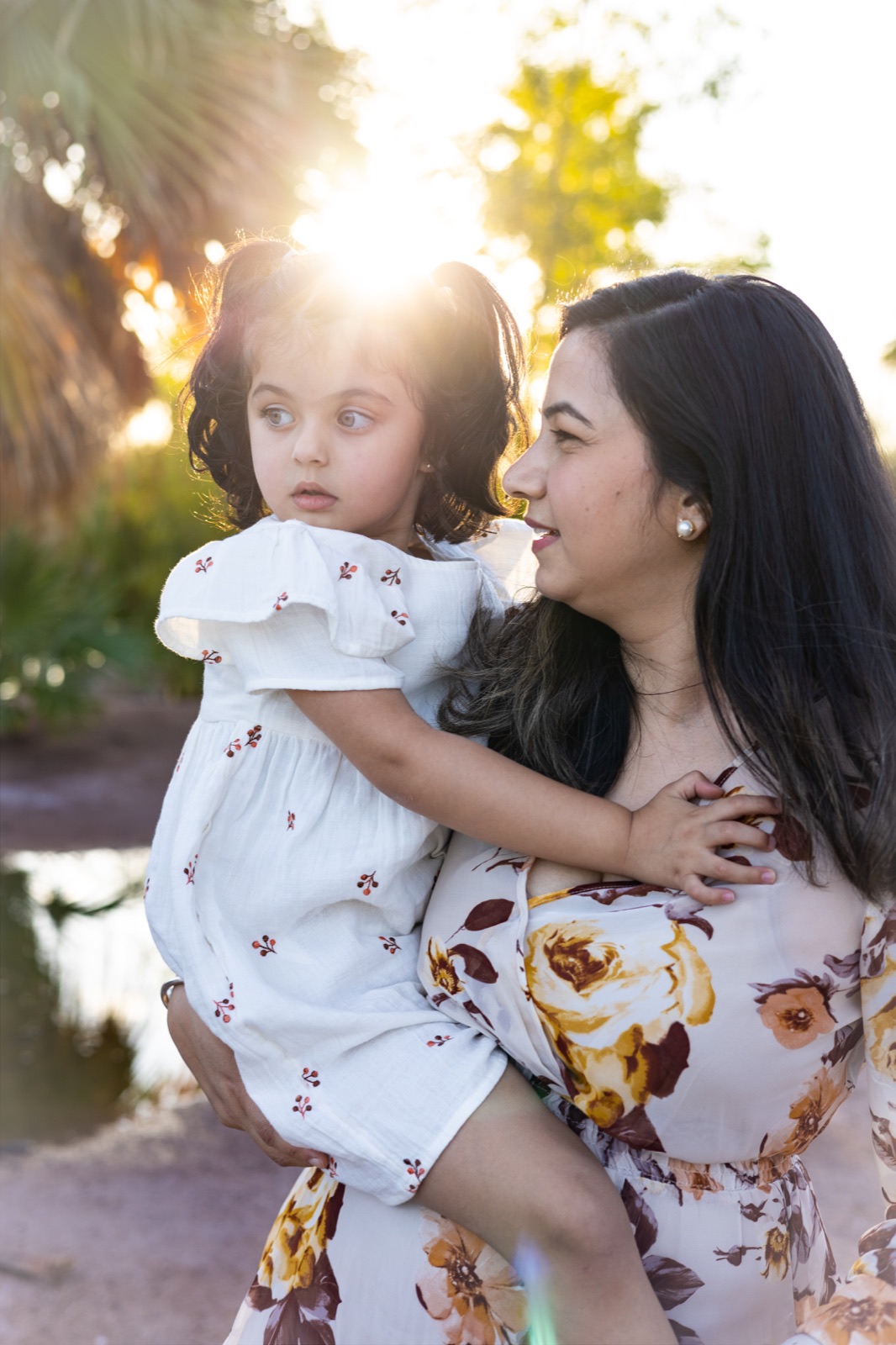 Mother and daughter portrait at golden hour